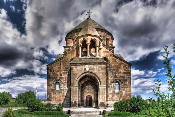 Echmiadzin (Hripsime, Gayane, Mother Cathedral) and Zvartnots Temple - Saint Gayane: basilica form, carved arches, and a story of flight