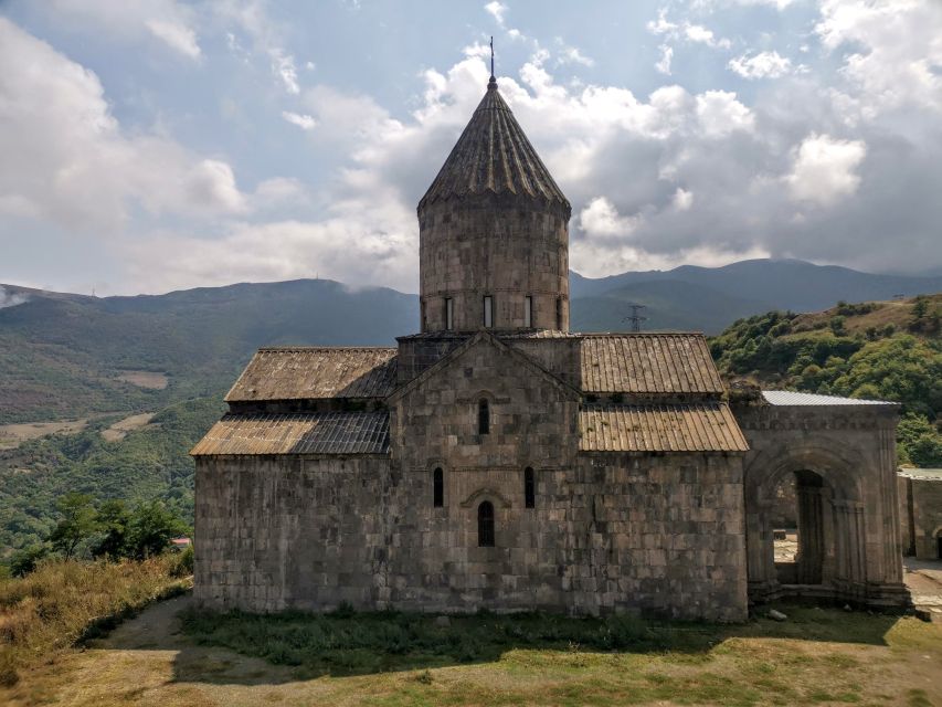 From Yerevan: Full-Day Tatev Monastery Complex Tour - Noravank’s red cliffs and the carved face of God