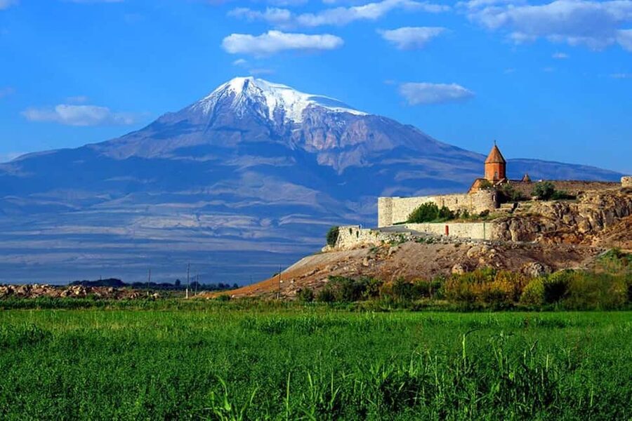 Khor Virap monastery on the Ararat plain with the snow cone of Ararat behind it